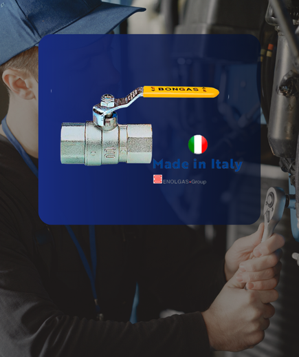 Válvula de esfera Enolgas com alavanca amarela BONGAS sobre fundo de manutenção industrial — Made in Italy.